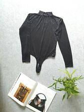 Body skinny Nero con perizoma in tulle nero. Veste taglia 42-46