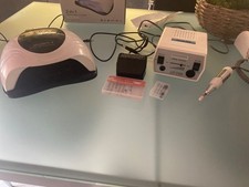 fresa e lampada per ricostruzione unghie