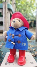 Orso classico Paddington (stivali + valigia incl.) Giocattolo morbido ufficiale (altezza 31 cm)