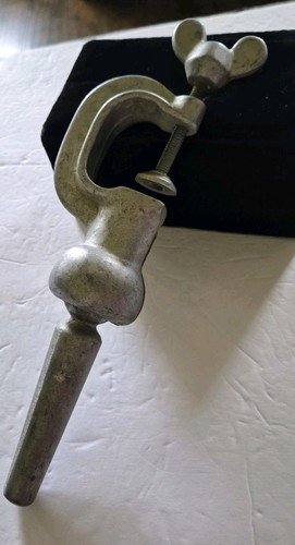 Morsetto porta blocco testa