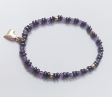 Bracciale in argento 925 elastico con cuore rosa ametista naturale ed ematite 