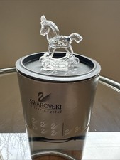 Statuina cavallo a dondolo in