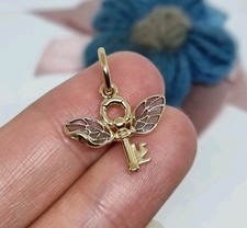 NUOVO ciondolo chiave alata