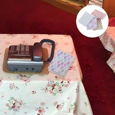 4 pezzi di libri in miniatura