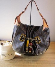 100% AUTENTICO LOUIS VUITTON LTD EDITION MONOGRAM KALAHARI GM $3.390