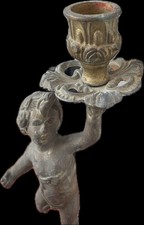 Candelabro antico putto in