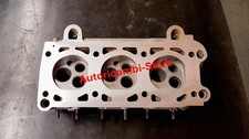 X083 - TESTATA MOTORE MASERATI BITURBO 3 VALVOLE PER CILINDRO NUDA
