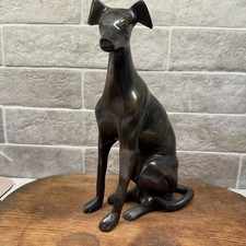 Statua cane frusta levriero