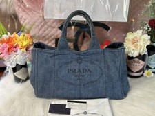 AUTENTICO LOGO PRADA CANAPA