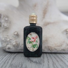 Miniature vide, bouteille en verre marbrée vert décoré d'une rose vintage