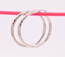 Orecchini a cerchio tondo