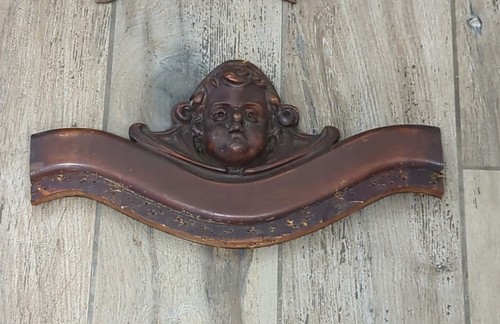 Antica testiera cherubino