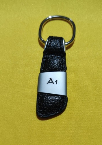 Portachiavi con scritta - con, logo