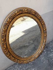 SPECCHIERA OVALE DORATA CON