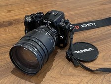Panasonic LUMIX G1 mirrorless con obiettivo Tamron 28 200 vecchia fotocamera kit