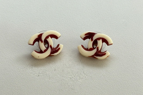 Chanel resin cream earrings - cc,