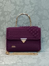 Borse donna lavorate a