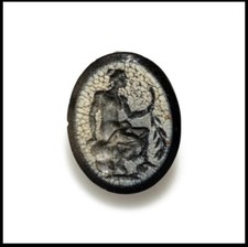 Un intaglio romano in pietra di vetro bianco