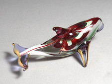 Statuina delfino verde marrone