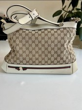 Borsa Gucci GG Supreme in tela nera e pelle bianca con tracolla