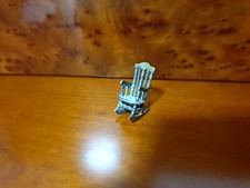 Miniature silver object