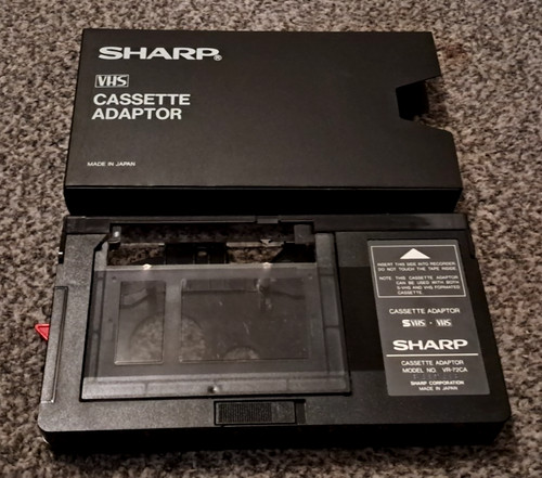Sharp vhs cassette adaptor - vhs,