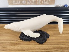 Scultura balena corallo