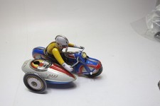 Moto di latta clockwork