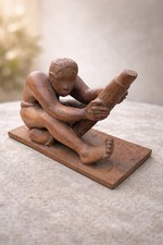 Scultura in legno intagliato-