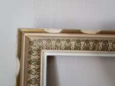 Cadre ancien en bois sculpté