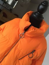 Piumino arancio Benetton