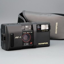 Olympus AF-1 con fotocamera