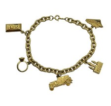 BRACCIALE VINTAGE AVON MONOPOLY METALLO PESANTE CHARM KITSCH RETRO NAVE CASTELLO AUTO ORO