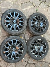 Gomme con cerchio e copricerchio invernali Hankook 195/50R15 82T.