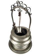 Riproduzione pozzo in peltro