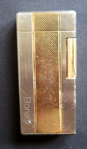 Vecchio accendino gas - vecchio, a