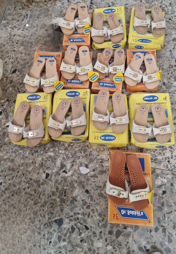 Zoccoli legno con tacco - in,
