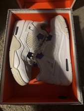 - Jordan 4 Retro Mid Viola