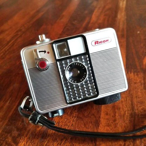 Ricoh auto half - half,