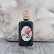Miniature vide, bouteille en verre marbrée vert décoré d'une rose vintage
