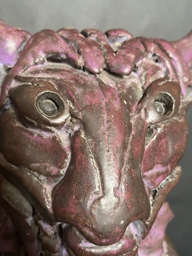 Antica scultura demone
