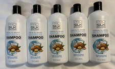 5 bottiglie shampoo salone