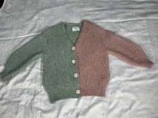 Maglione bicolore verde e rosa