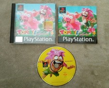 Tombi avec Stickers Langue -