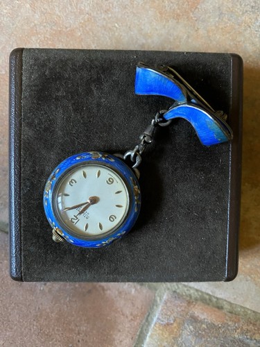 Orologio spilla donna argento