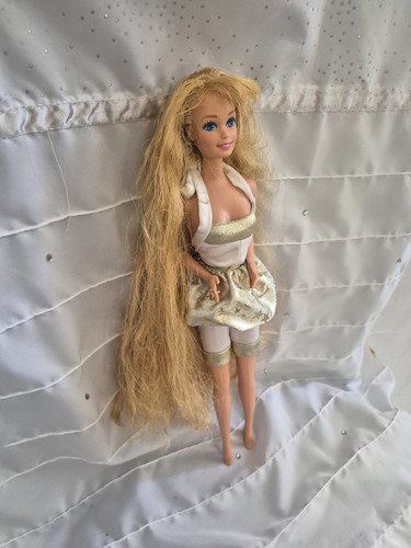 Barbie bambola capelli