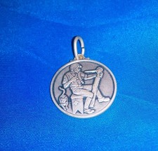 CIONDOLO MEDAGLIETTA PINOCCHIO