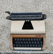 MACCHINA DA SCRIVERE ANNI 60 - LILLIPUT - TIPO OLIVETTI VALENTINE. Come da foto.