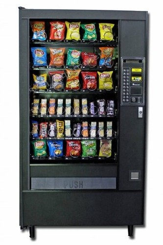 Distributore automatico - , di