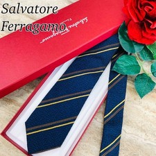 Cravatta collo Salvatore Ferragamo nuova mai usata blu oro a righe 100%...